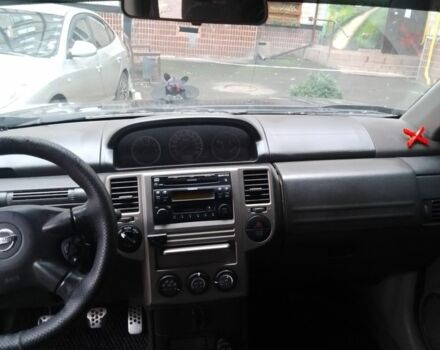 Черный Ниссан ИксТрейл, объемом двигателя 2.2 л и пробегом 260 тыс. км за 4500 $, фото 4 на Automoto.ua