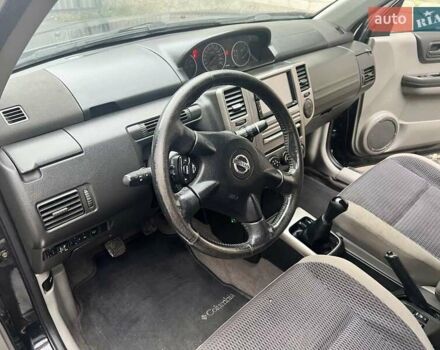 Черный Ниссан ИксТрейл, объемом двигателя 2 л и пробегом 150 тыс. км за 6500 $, фото 7 на Automoto.ua