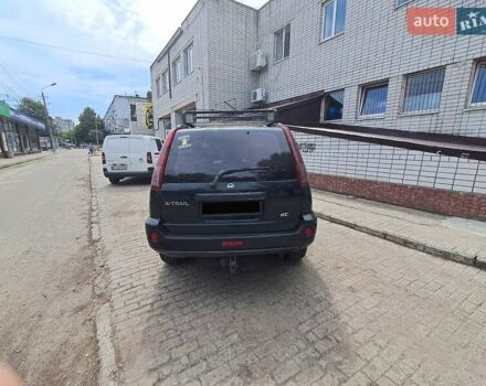 Черный Ниссан ИксТрейл, объемом двигателя 2.2 л и пробегом 340 тыс. км за 5000 $, фото 6 на Automoto.ua