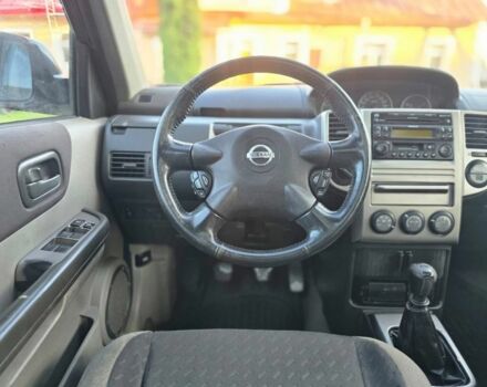 Черный Ниссан ИксТрейл, объемом двигателя 2.2 л и пробегом 290 тыс. км за 4500 $, фото 11 на Automoto.ua