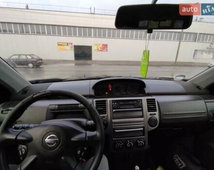 Черный Ниссан ИксТрейл, объемом двигателя 2.2 л и пробегом 373 тыс. км за 5800 $, фото 12 на Automoto.ua