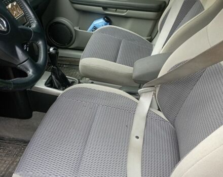 Черный Ниссан ИксТрейл, объемом двигателя 2 л и пробегом 196 тыс. км за 4300 $, фото 5 на Automoto.ua