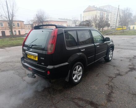 Чорний Ніссан ІксТрейл, об'ємом двигуна 2 л та пробігом 123 тис. км за 3100 $, фото 4 на Automoto.ua