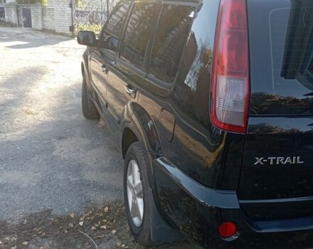 Черный Ниссан ИксТрейл, объемом двигателя 2 л и пробегом 196 тыс. км за 4300 $, фото 1 на Automoto.ua