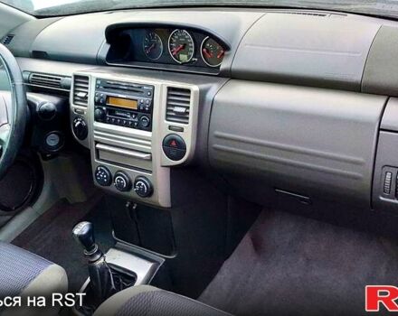 Черный Ниссан ИксТрейл, объемом двигателя 2.2 л и пробегом 360 тыс. км за 3500 $, фото 4 на Automoto.ua