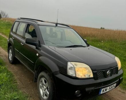 Черный Ниссан ИксТрейл, объемом двигателя 2.2 л и пробегом 290 тыс. км за 4500 $, фото 3 на Automoto.ua
