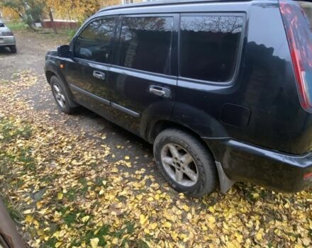 Черный Ниссан ИксТрейл, объемом двигателя 2.2 л и пробегом 397 тыс. км за 3700 $, фото 3 на Automoto.ua