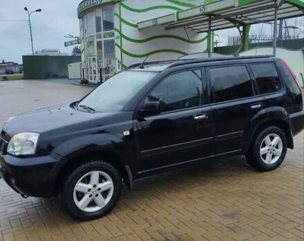 Черный Ниссан ИксТрейл, объемом двигателя 2.2 л и пробегом 373 тыс. км за 5800 $, фото 6 на Automoto.ua