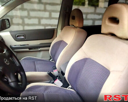 Черный Ниссан ИксТрейл, объемом двигателя 2 л и пробегом 200 тыс. км за 6200 $, фото 8 на Automoto.ua