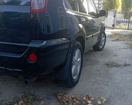 Черный Ниссан ИксТрейл, объемом двигателя 0 л и пробегом 196 тыс. км за 4100 $, фото 2 на Automoto.ua