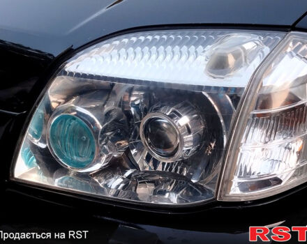 Черный Ниссан ИксТрейл, объемом двигателя 2 л и пробегом 200 тыс. км за 6200 $, фото 4 на Automoto.ua