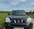 Черный Ниссан ИксТрейл, объемом двигателя 2.2 л и пробегом 245 тыс. км за 2550 $, фото 1 на Automoto.ua