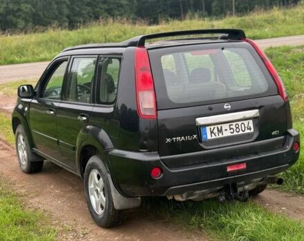 Черный Ниссан ИксТрейл, объемом двигателя 2.2 л и пробегом 290 тыс. км за 4500 $, фото 5 на Automoto.ua