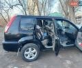 Черный Ниссан ИксТрейл, объемом двигателя 2 л и пробегом 250 тыс. км за 6500 $, фото 2 на Automoto.ua