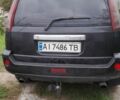 Черный Ниссан ИксТрейл, объемом двигателя 2.2 л и пробегом 320 тыс. км за 6000 $, фото 1 на Automoto.ua