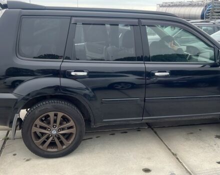 Черный Ниссан ИксТрейл, объемом двигателя 2.2 л и пробегом 260 тыс. км за 4254 $, фото 2 на Automoto.ua