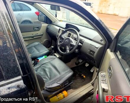 Черный Ниссан ИксТрейл, объемом двигателя 2.2 л и пробегом 180 тыс. км за 4500 $, фото 6 на Automoto.ua