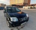 Черный Ниссан ИксТрейл, объемом двигателя 2.5 л и пробегом 135 тыс. км за 7500 $, фото 2 на Automoto.ua