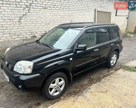 Черный Ниссан ИксТрейл, объемом двигателя 2 л и пробегом 150 тыс. км за 6500 $, фото 3 на Automoto.ua