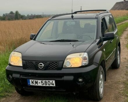 Черный Ниссан ИксТрейл, объемом двигателя 2.2 л и пробегом 290 тыс. км за 4500 $, фото 2 на Automoto.ua