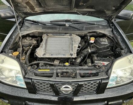 Черный Ниссан ИксТрейл, объемом двигателя 2.2 л и пробегом 252 тыс. км за 3600 $, фото 4 на Automoto.ua