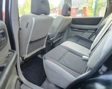 Черный Ниссан ИксТрейл, объемом двигателя 2.2 л и пробегом 290 тыс. км за 4500 $, фото 17 на Automoto.ua