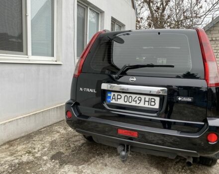 Черный Ниссан ИксТрейл, объемом двигателя 2 л и пробегом 300 тыс. км за 7000 $, фото 2 на Automoto.ua