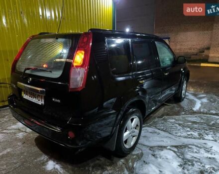 Черный Ниссан ИксТрейл, объемом двигателя 2.49 л и пробегом 128 тыс. км за 7500 $, фото 5 на Automoto.ua