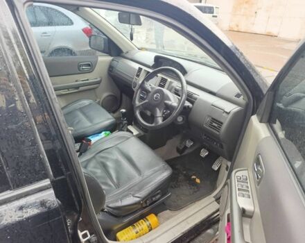 Черный Ниссан ИксТрейл, объемом двигателя 2 л и пробегом 180 тыс. км за 4500 $, фото 5 на Automoto.ua