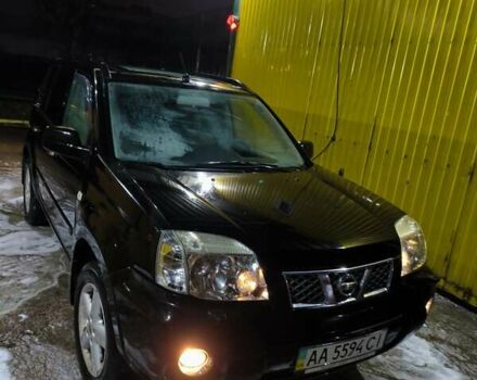 Черный Ниссан ИксТрейл, объемом двигателя 2.49 л и пробегом 128 тыс. км за 7500 $, фото 4 на Automoto.ua