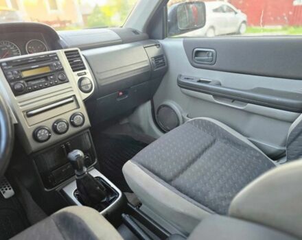 Черный Ниссан ИксТрейл, объемом двигателя 2.2 л и пробегом 290 тыс. км за 4500 $, фото 16 на Automoto.ua