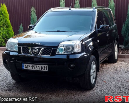 Черный Ниссан ИксТрейл, объемом двигателя 2 л и пробегом 200 тыс. км за 6200 $, фото 1 на Automoto.ua