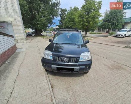 Черный Ниссан ИксТрейл, объемом двигателя 2.2 л и пробегом 340 тыс. км за 5000 $, фото 7 на Automoto.ua