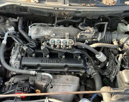 Черный Ниссан ИксТрейл, объемом двигателя 2.2 л и пробегом 260 тыс. км за 4254 $, фото 8 на Automoto.ua