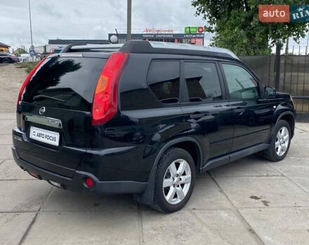 Черный Ниссан ИксТрейл, объемом двигателя 2 л и пробегом 295 тыс. км за 8090 $, фото 4 на Automoto.ua