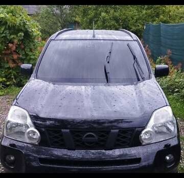 Черный Ниссан ИксТрейл, объемом двигателя 2 л и пробегом 140 тыс. км за 11600 $, фото 2 на Automoto.ua