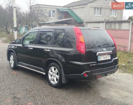 Черный Ниссан ИксТрейл, объемом двигателя 2.5 л и пробегом 197 тыс. км за 8500 $, фото 22 на Automoto.ua