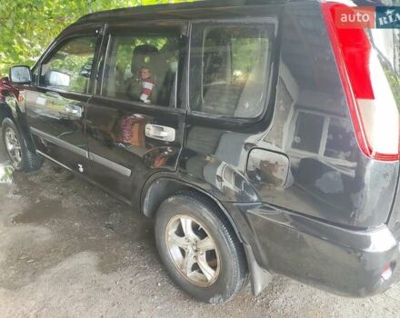 Черный Ниссан ИксТрейл, объемом двигателя 2.49 л и пробегом 195 тыс. км за 5200 $, фото 2 на Automoto.ua