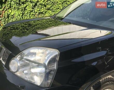 Черный Ниссан ИксТрейл, объемом двигателя 2 л и пробегом 140 тыс. км за 11600 $, фото 4 на Automoto.ua