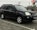 Черный Ниссан ИксТрейл, объемом двигателя 2.49 л и пробегом 197 тыс. км за 8888 $, фото 1 на Automoto.ua