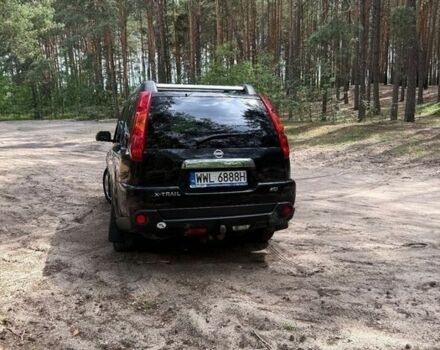 Черный Ниссан ИксТрейл, объемом двигателя 2 л и пробегом 259 тыс. км за 3200 $, фото 2 на Automoto.ua