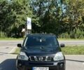 Чорний Ніссан ІксТрейл, об'ємом двигуна 2 л та пробігом 230 тис. км за 8150 $, фото 1 на Automoto.ua
