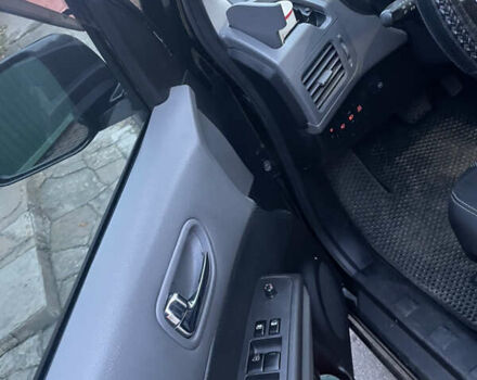 Черный Ниссан ИксТрейл, объемом двигателя 2.5 л и пробегом 236 тыс. км за 8600 $, фото 16 на Automoto.ua