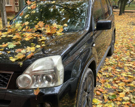 Черный Ниссан ИксТрейл, объемом двигателя 2 л и пробегом 257 тыс. км за 9147 $, фото 1 на Automoto.ua