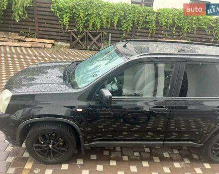 Черный Ниссан ИксТрейл, объемом двигателя 2 л и пробегом 175 тыс. км за 11500 $, фото 1 на Automoto.ua