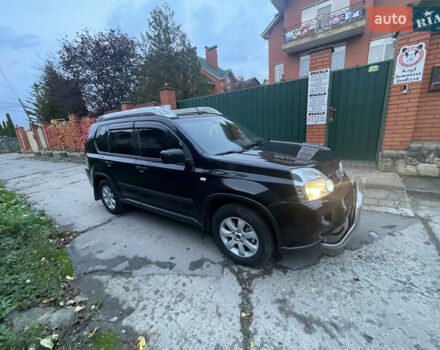 Черный Ниссан ИксТрейл, объемом двигателя 2.5 л и пробегом 236 тыс. км за 8600 $, фото 5 на Automoto.ua
