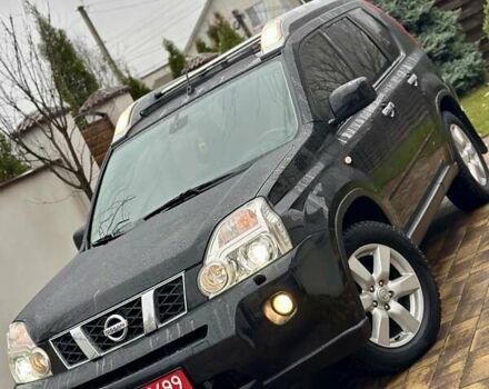 Черный Ниссан ИксТрейл, объемом двигателя 2 л и пробегом 264 тыс. км за 11250 $, фото 12 на Automoto.ua