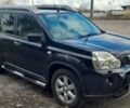 Черный Ниссан ИксТрейл, объемом двигателя 2 л и пробегом 259 тыс. км за 9999 $, фото 2 на Automoto.ua