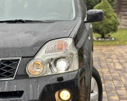 Черный Ниссан ИксТрейл, объемом двигателя 2 л и пробегом 264 тыс. км за 11250 $, фото 14 на Automoto.ua