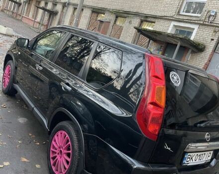 Чорний Ніссан ІксТрейл, об'ємом двигуна 2 л та пробігом 305 тис. км за 4299 $, фото 3 на Automoto.ua